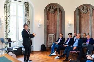 Dr. Ralf Schneider presenting at the Software Excellence Network (SEN) inside of Schloss Fürstlich Drehna