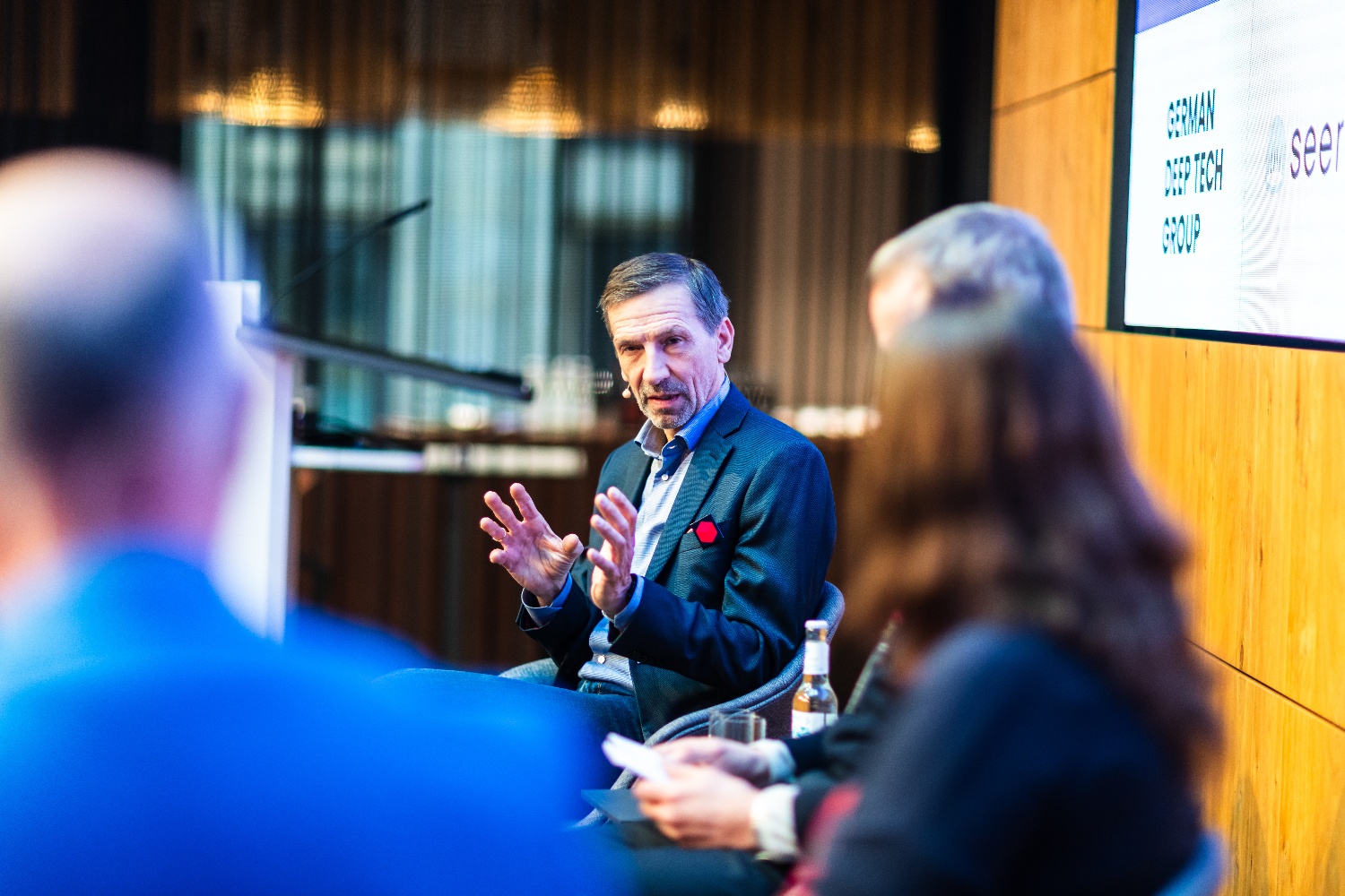 Dr. Stefan Poledna sharing thoughts with his fellow panelists