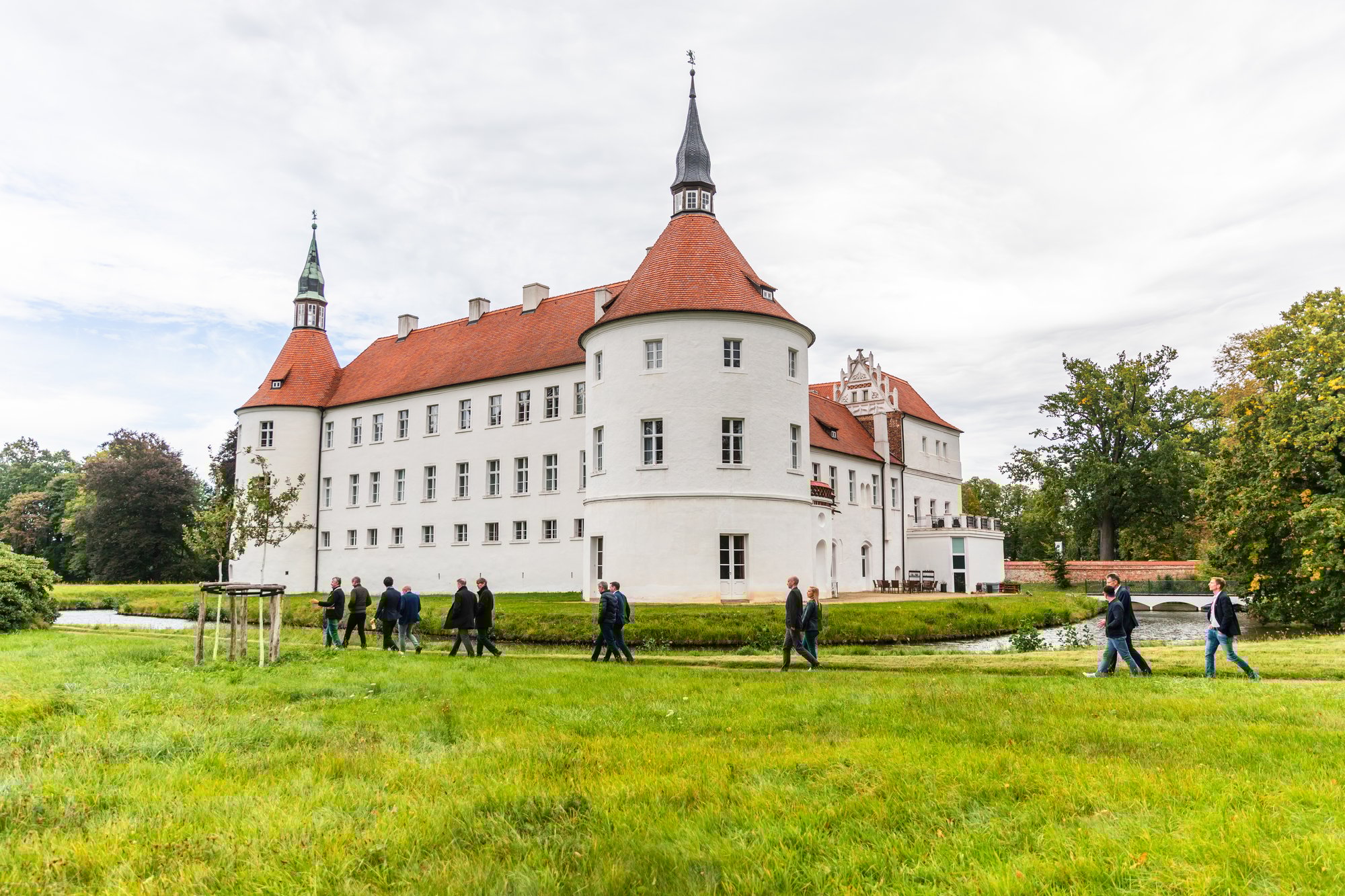 Walking along the moat of the majestic Schloss Fürstlich Drehna